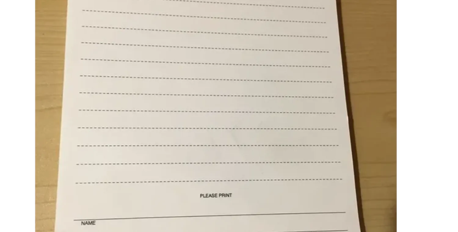 Photo of a lined notepad with "Here's my idea:" at the top. Nothing is written on it.
