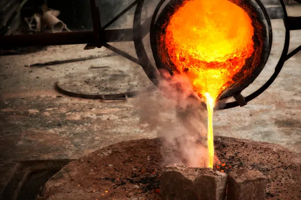 bronze being casted into ingots