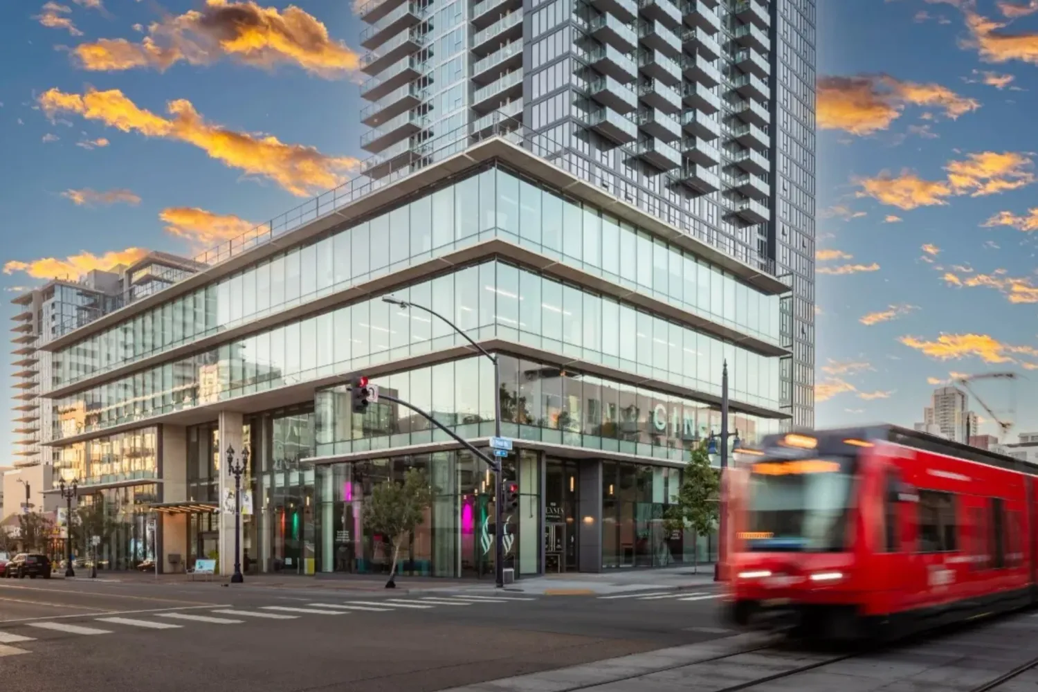 UCSD Park and Market building with trolley going by