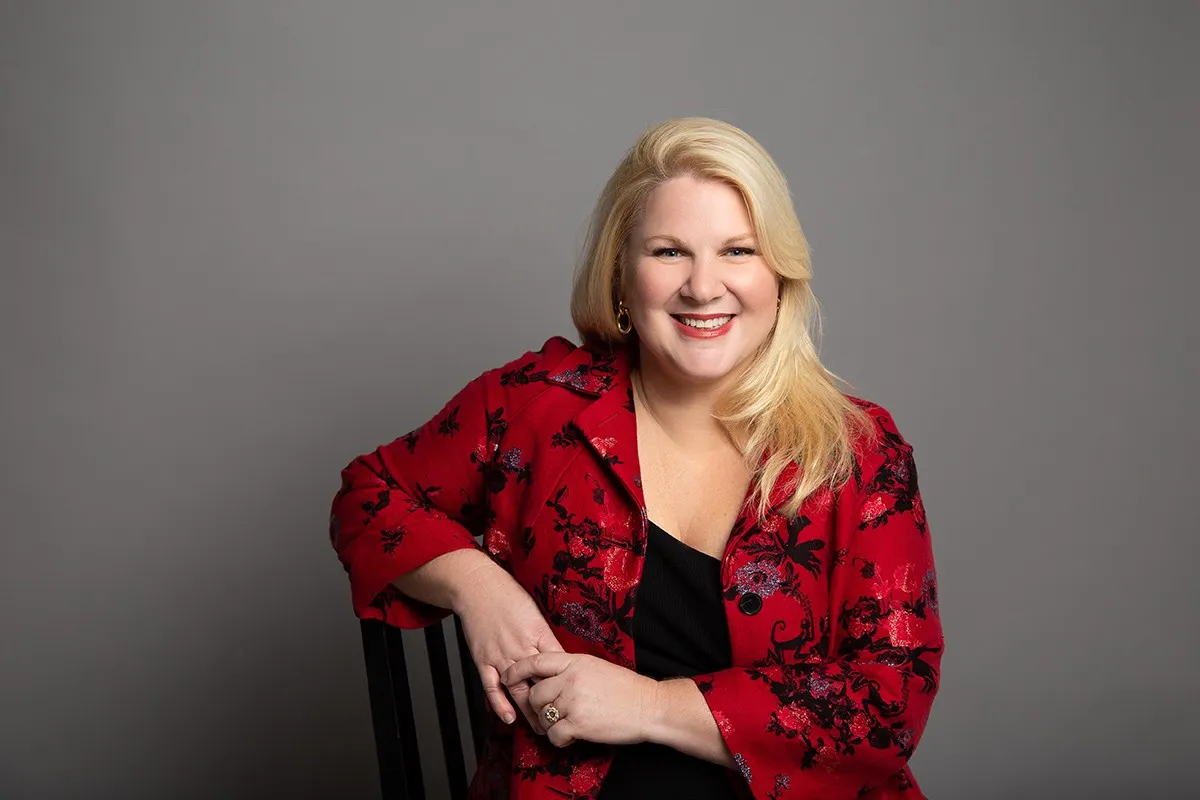 Headshot of Laura Tamblyn Watts